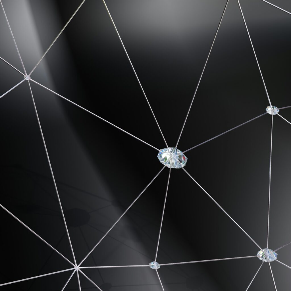 Close-up macro of a brilliant-cut diamond on a black background